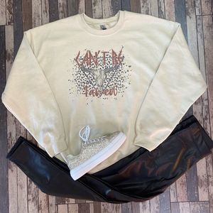 Can’t Be Tamed Sweatshirt